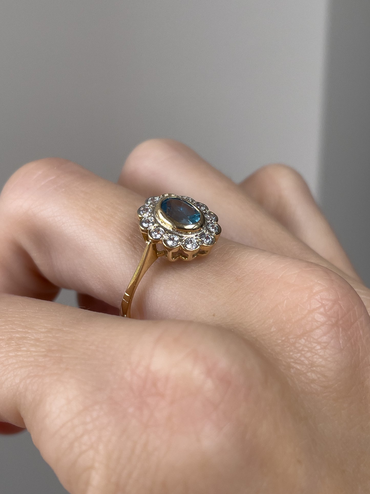 Blue topaz cluster ring on 9ct gold