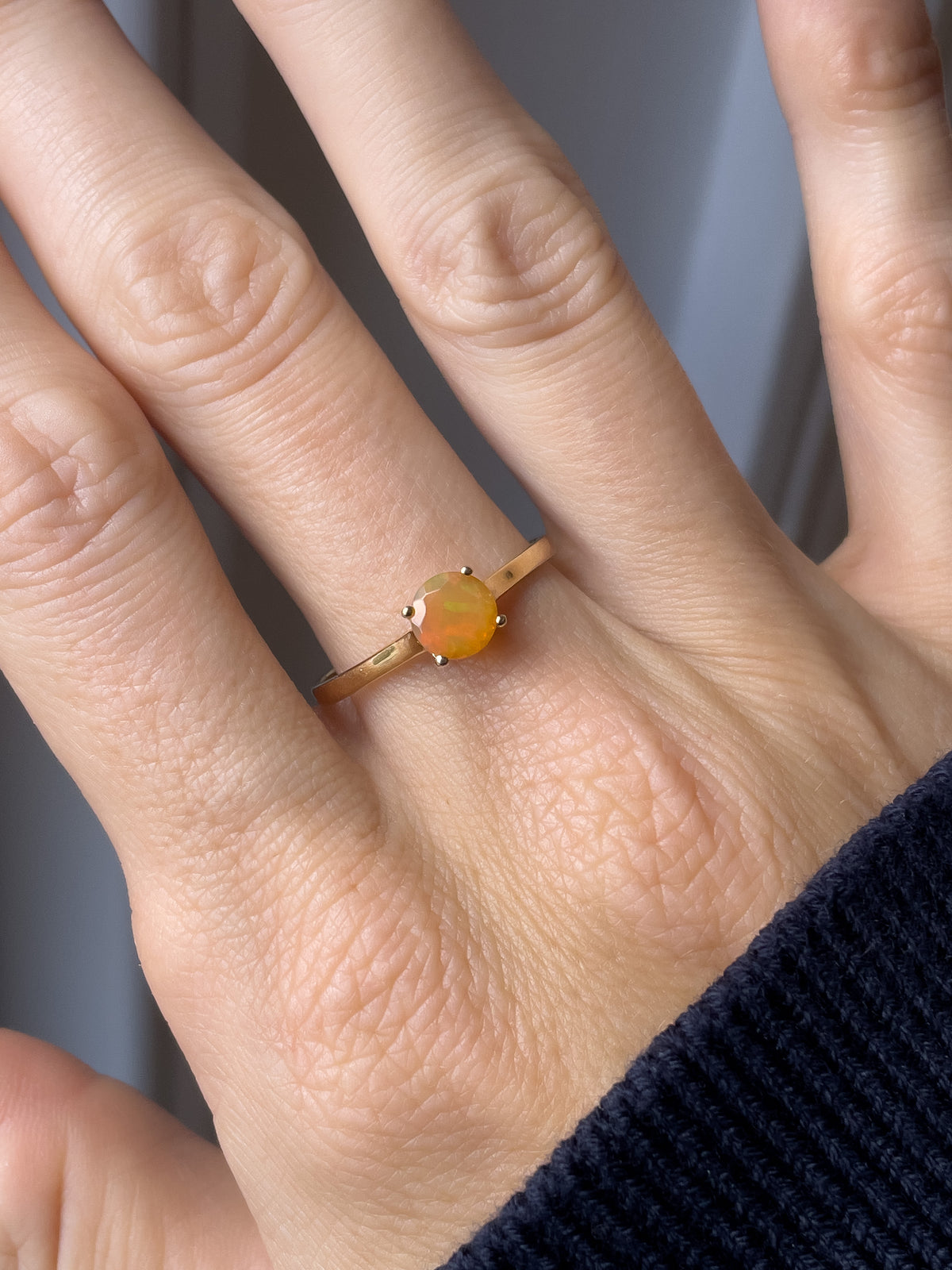 Orange opal solitaire ring
