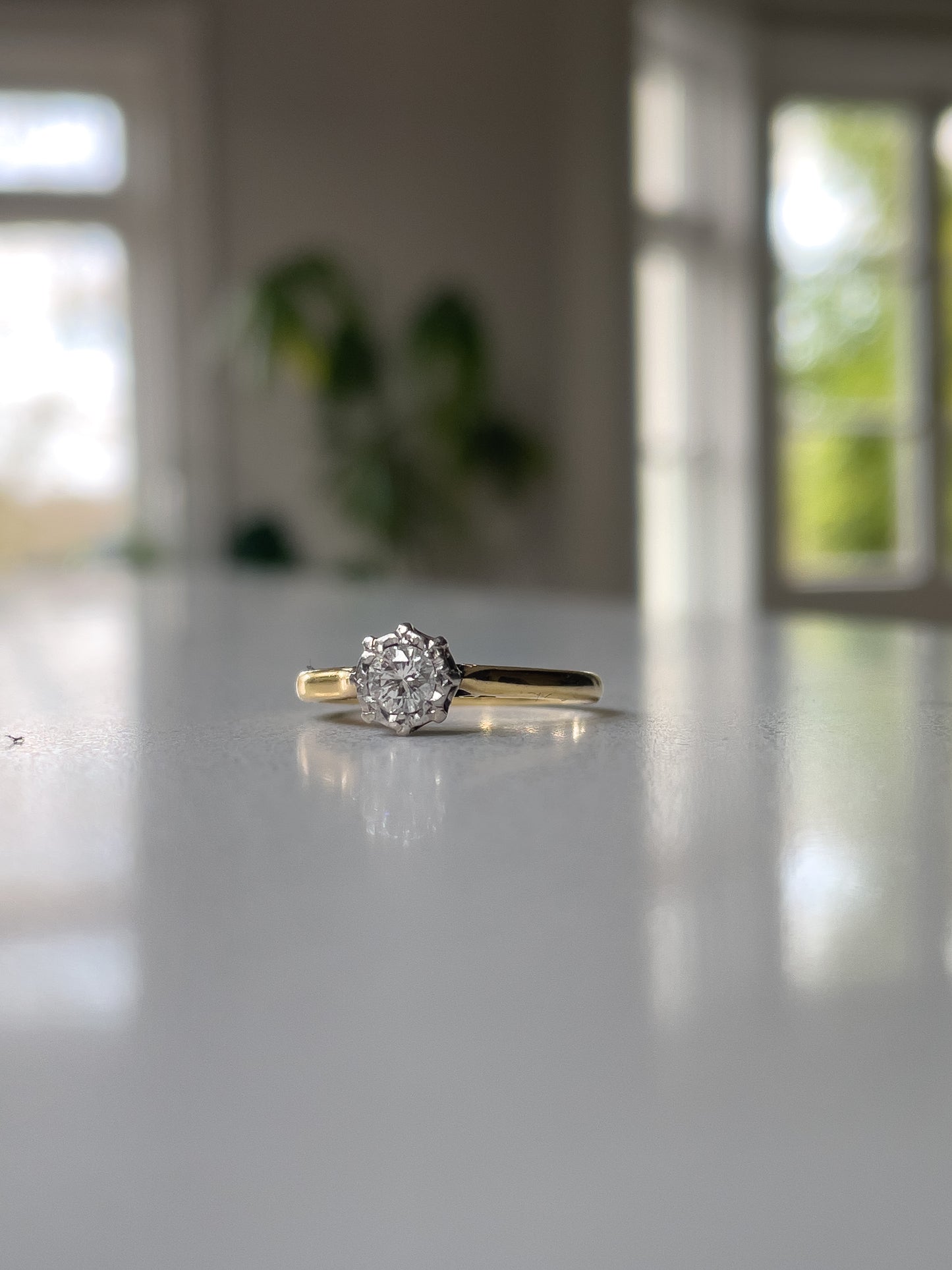 Vintage 1930s diamond solitaire ring on 18ct gold and platinum