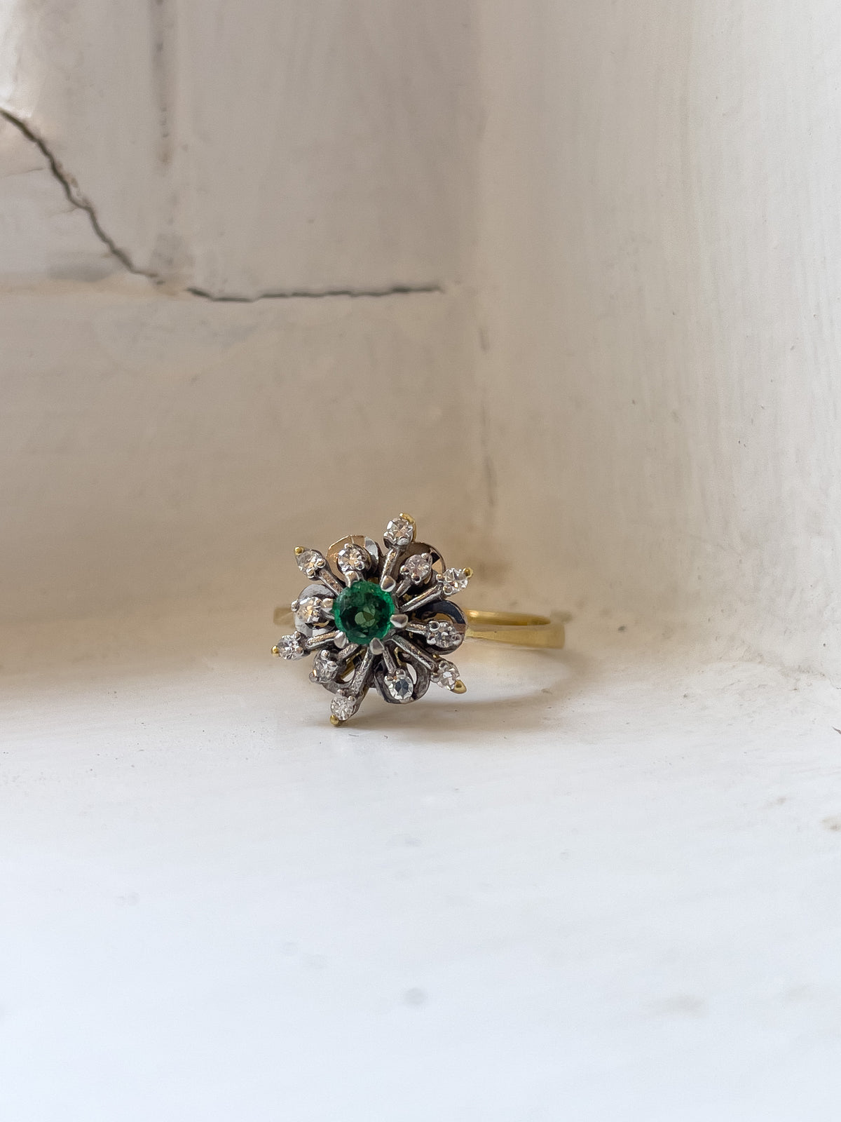 Vintage emerald and diamond snowflake cluster ring on 18ct gold