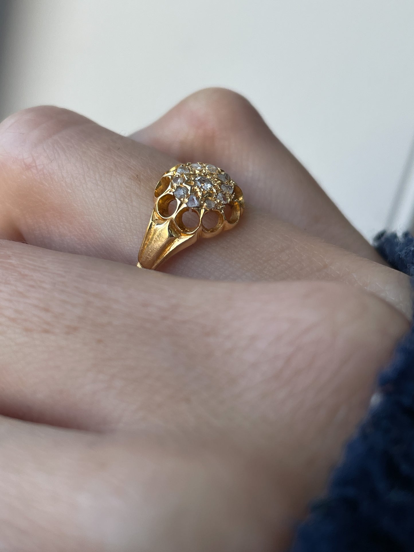 Antique diamond starburst halo ring on 18ct gold