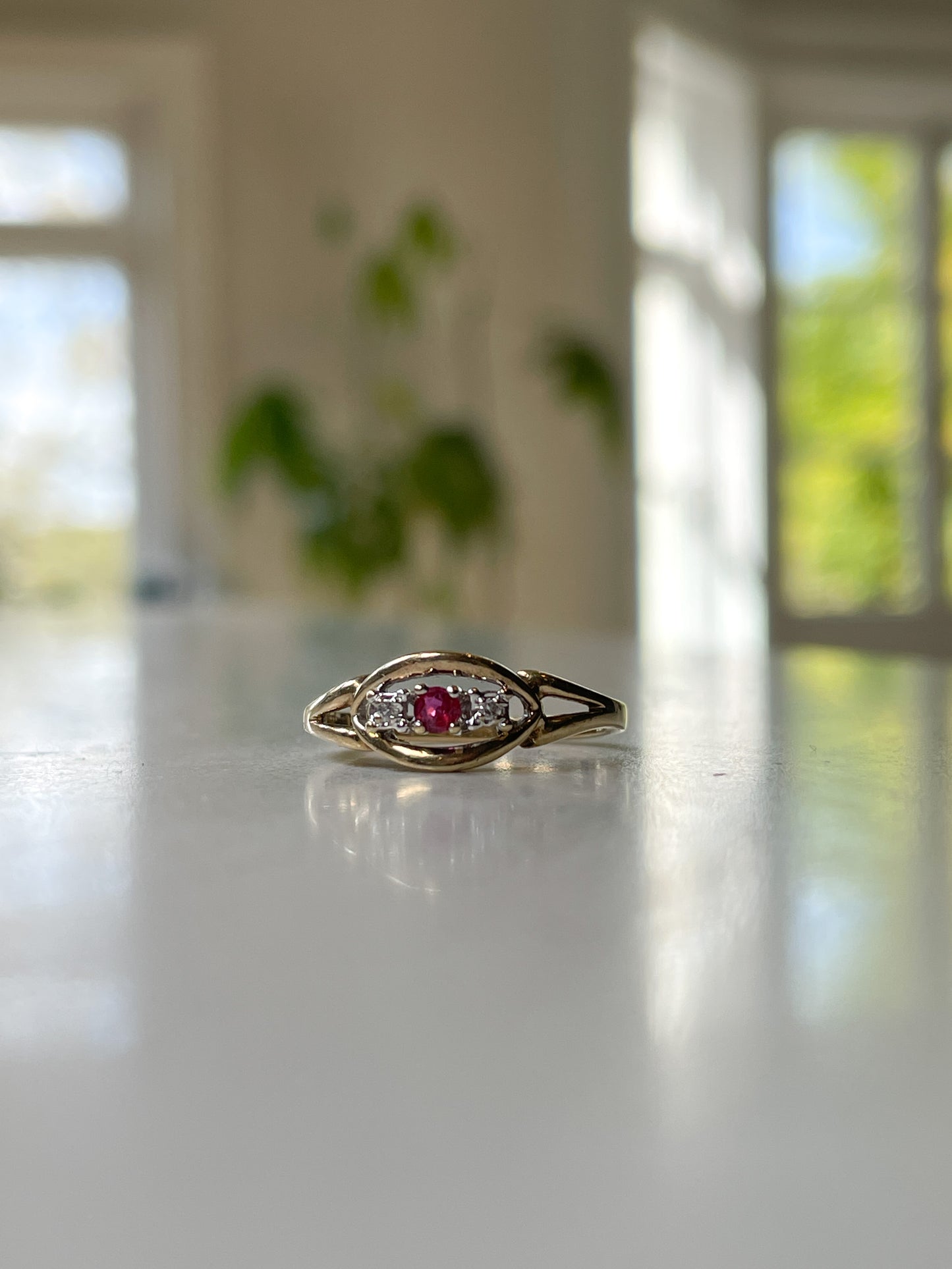 Vintage ruby and diamond trilogy ring on 9ct gold