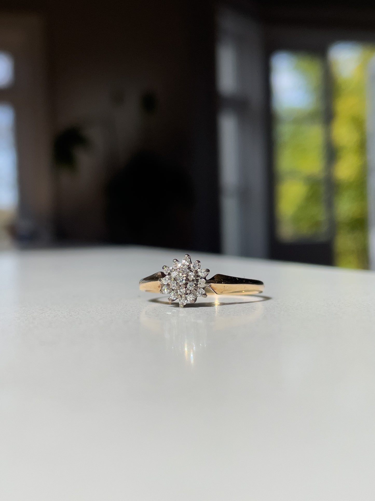 Vintage tiered diamond cluster ring on 9ct gold