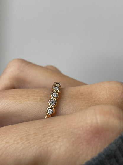 Vintage wavy diamond half eternity ring on 9ct gold
