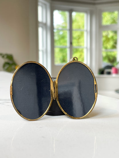 1970s large sterling silver locket with floral design