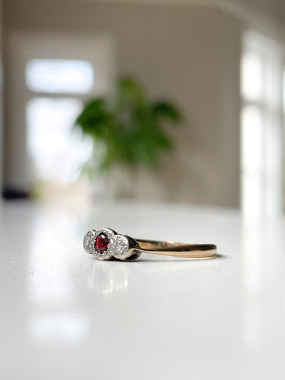 Vintage garnet and diamond trilogy ring