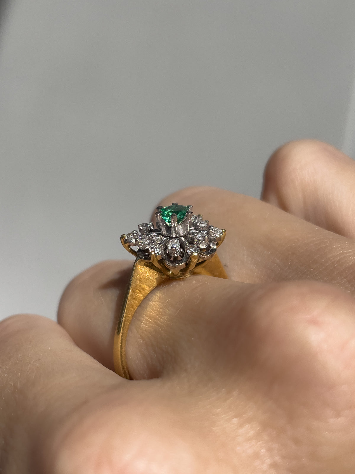 Vintage emerald and diamond snowflake cluster ring on 18ct gold