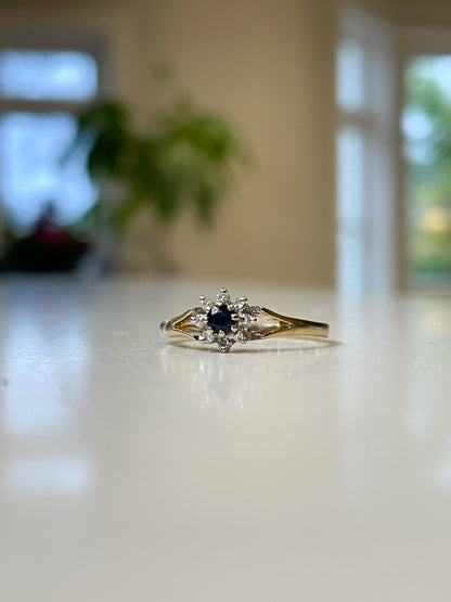 Vintage sapphire and diamond daisy cluster ring from 1985