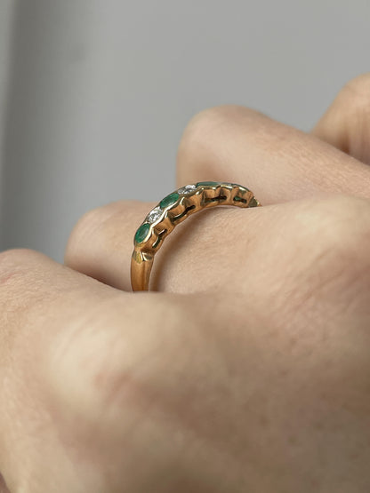 Vintage diamond and emerald 7-stone half eternity ring