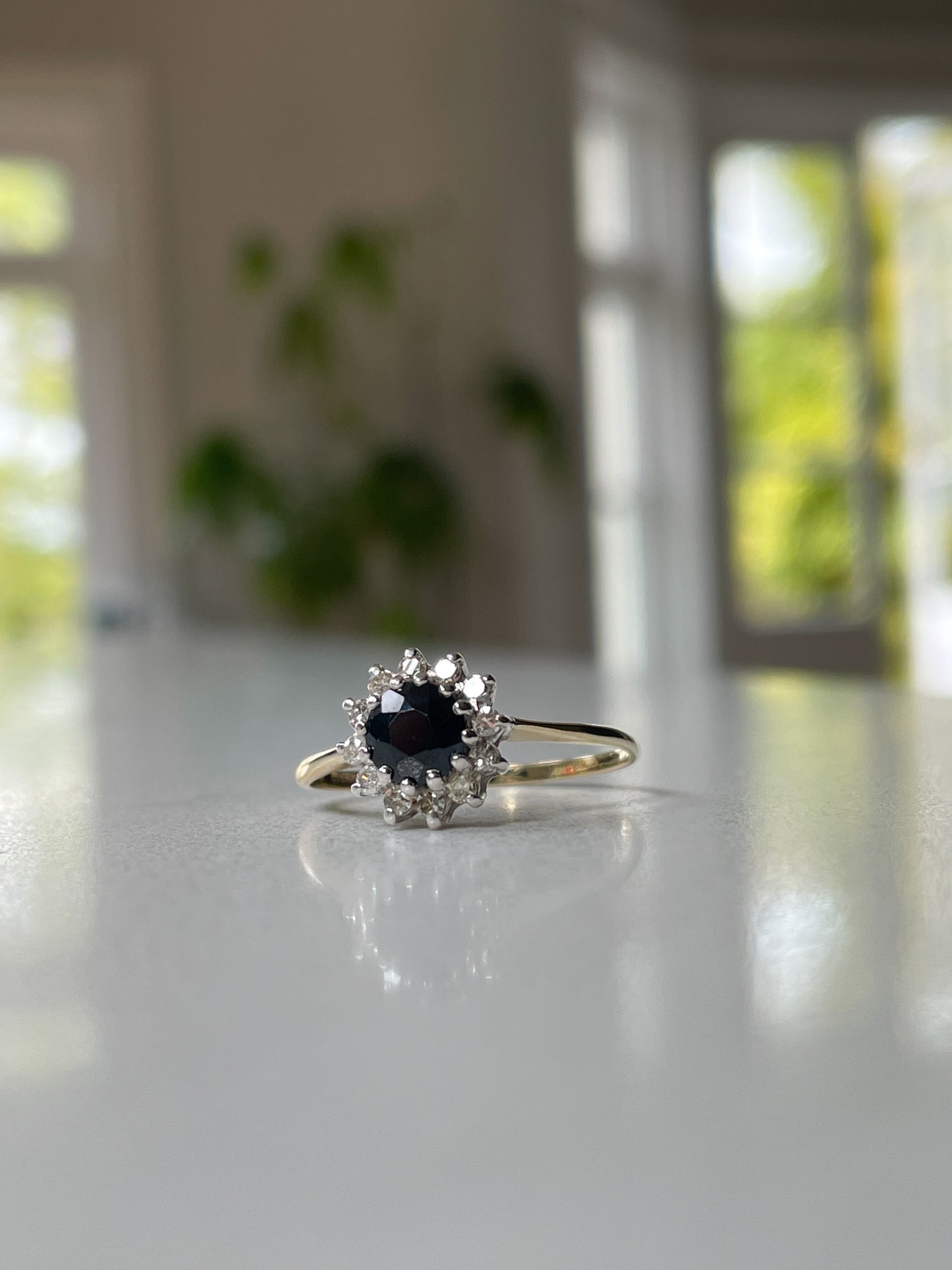 Vintage sapphire and diamond cluster ring on 9ct gold