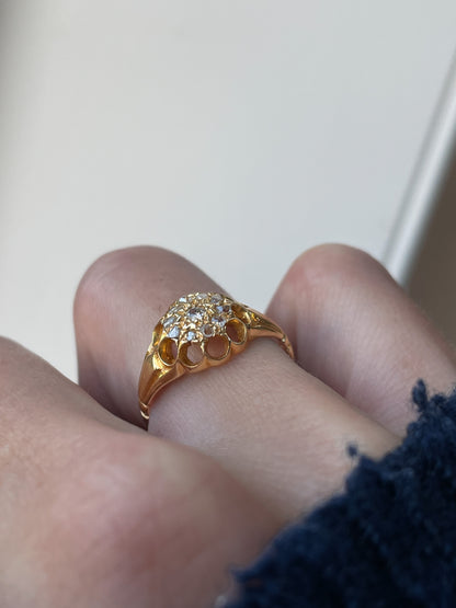 Antique diamond starburst halo ring on 18ct gold