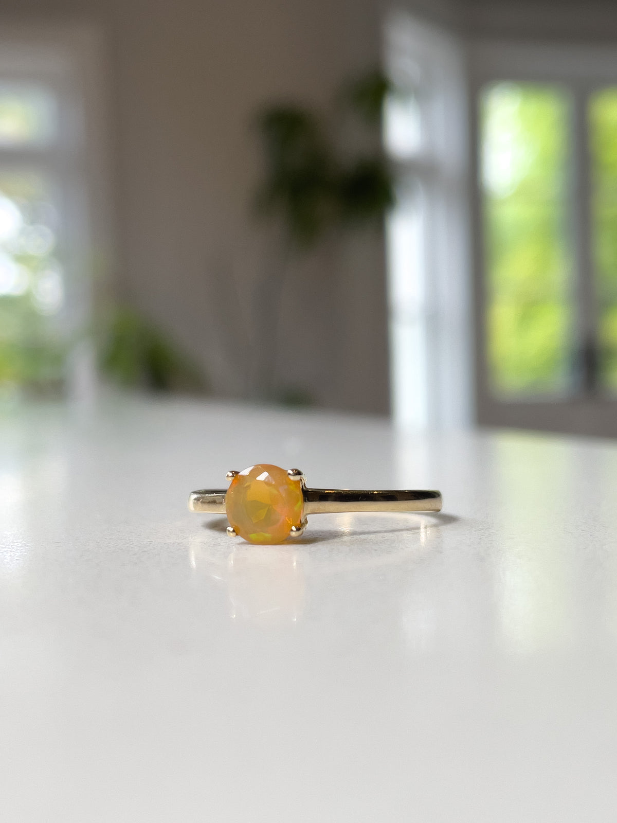 Orange opal solitaire ring