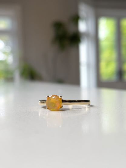 Orange opal solitaire ring