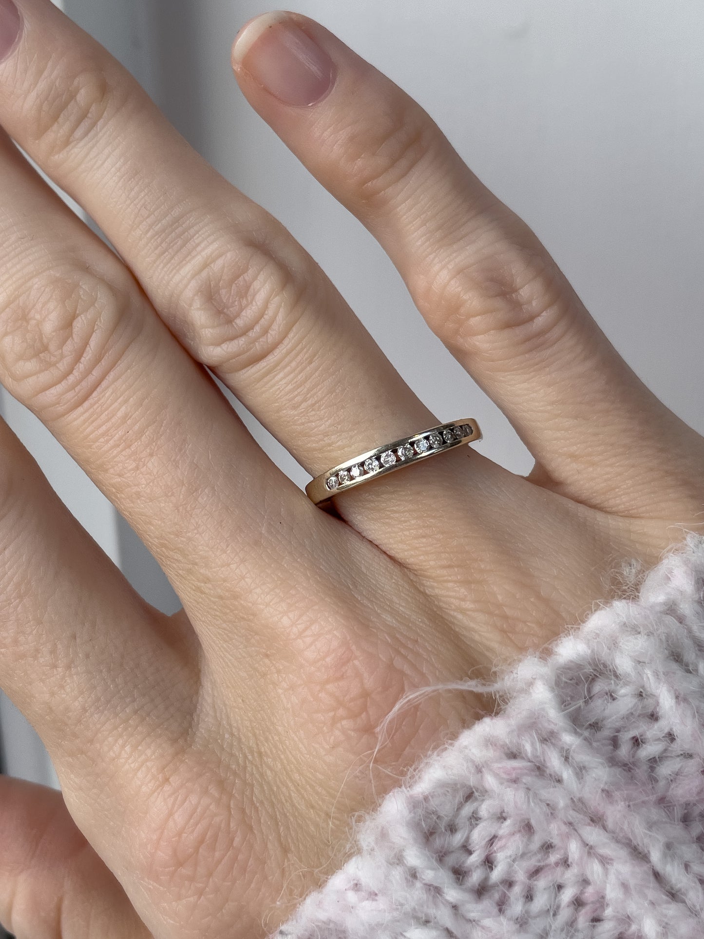 Vintage channel set diamond half eternity ring on 9ct white gold
