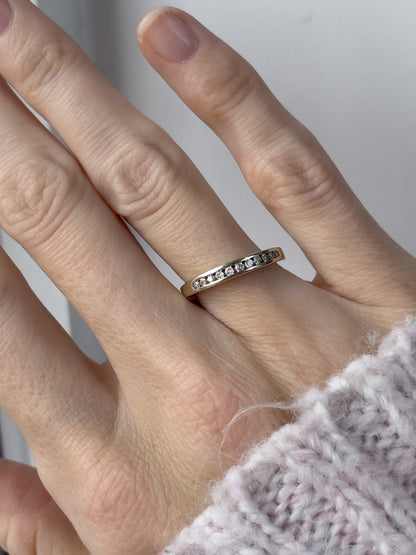 Vintage channel set diamond half eternity ring on 9ct white gold