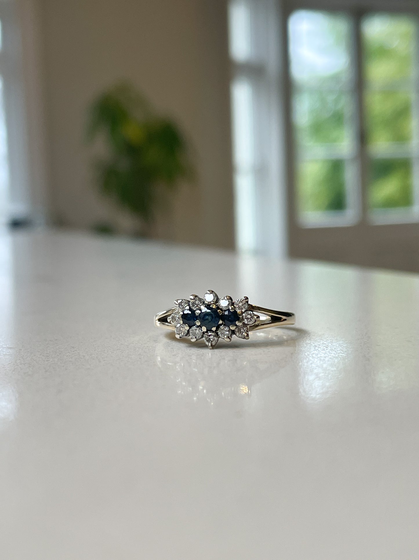 Vintage sapphire and diamond trilogy cluster ring on 9ct gold