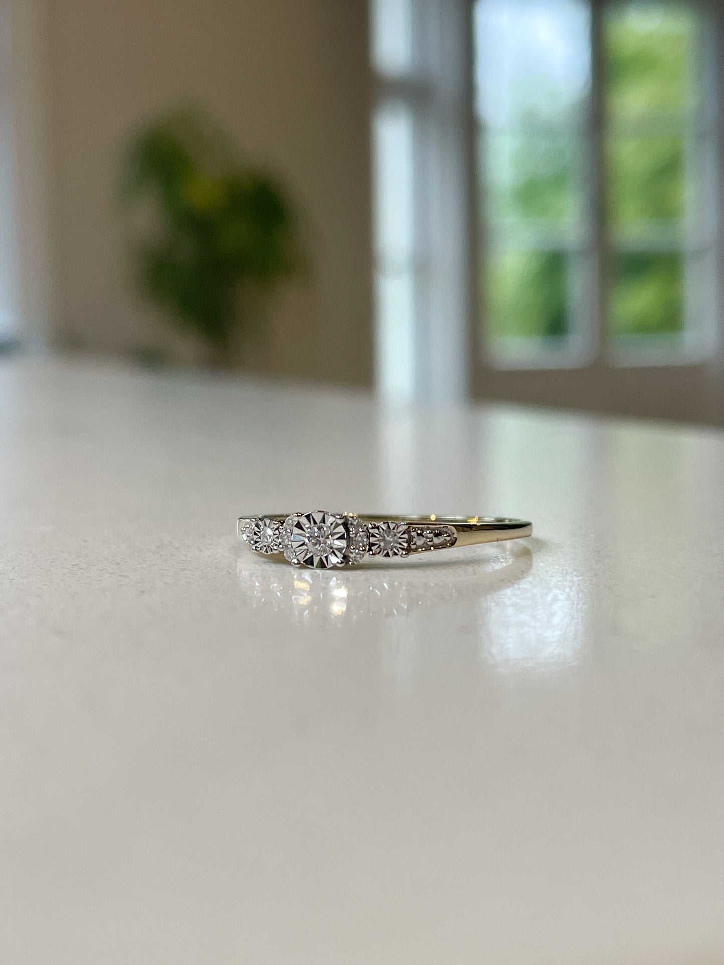 Contemporary diamond cluster ring on 9ct gold