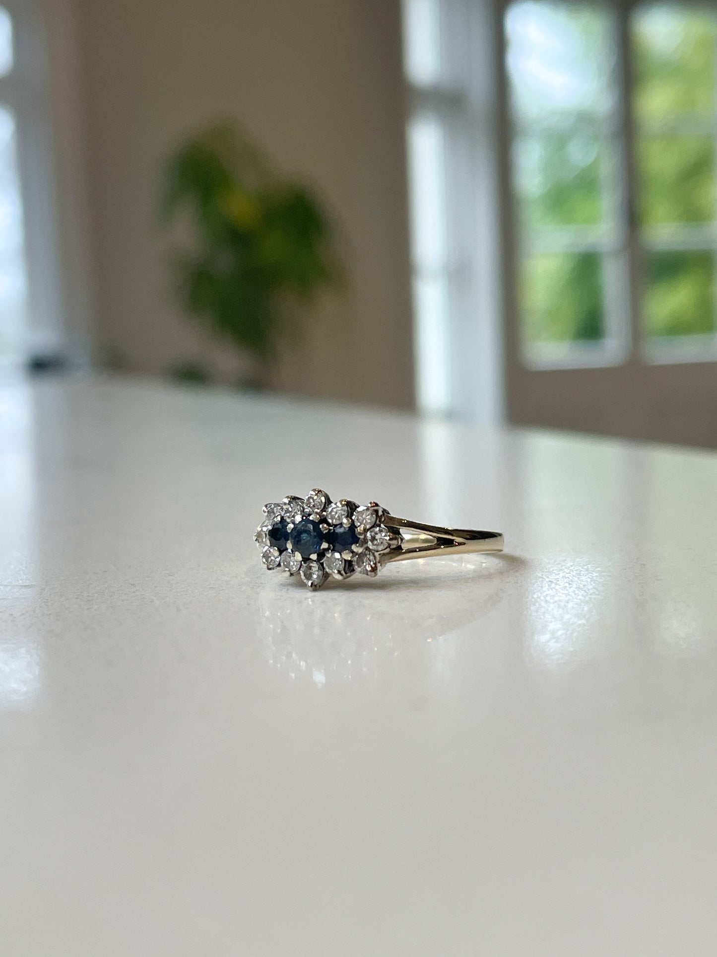Vintage sapphire and diamond trilogy cluster ring on 9ct gold