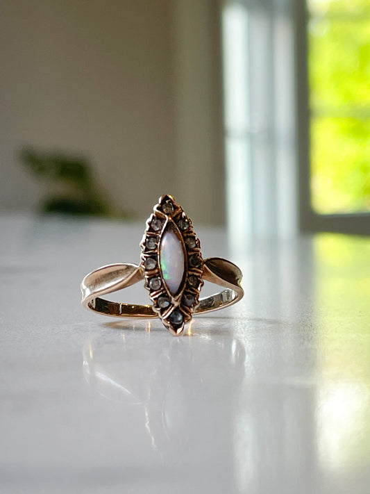 Victorian opal and diamond navette ring on 9ct gold