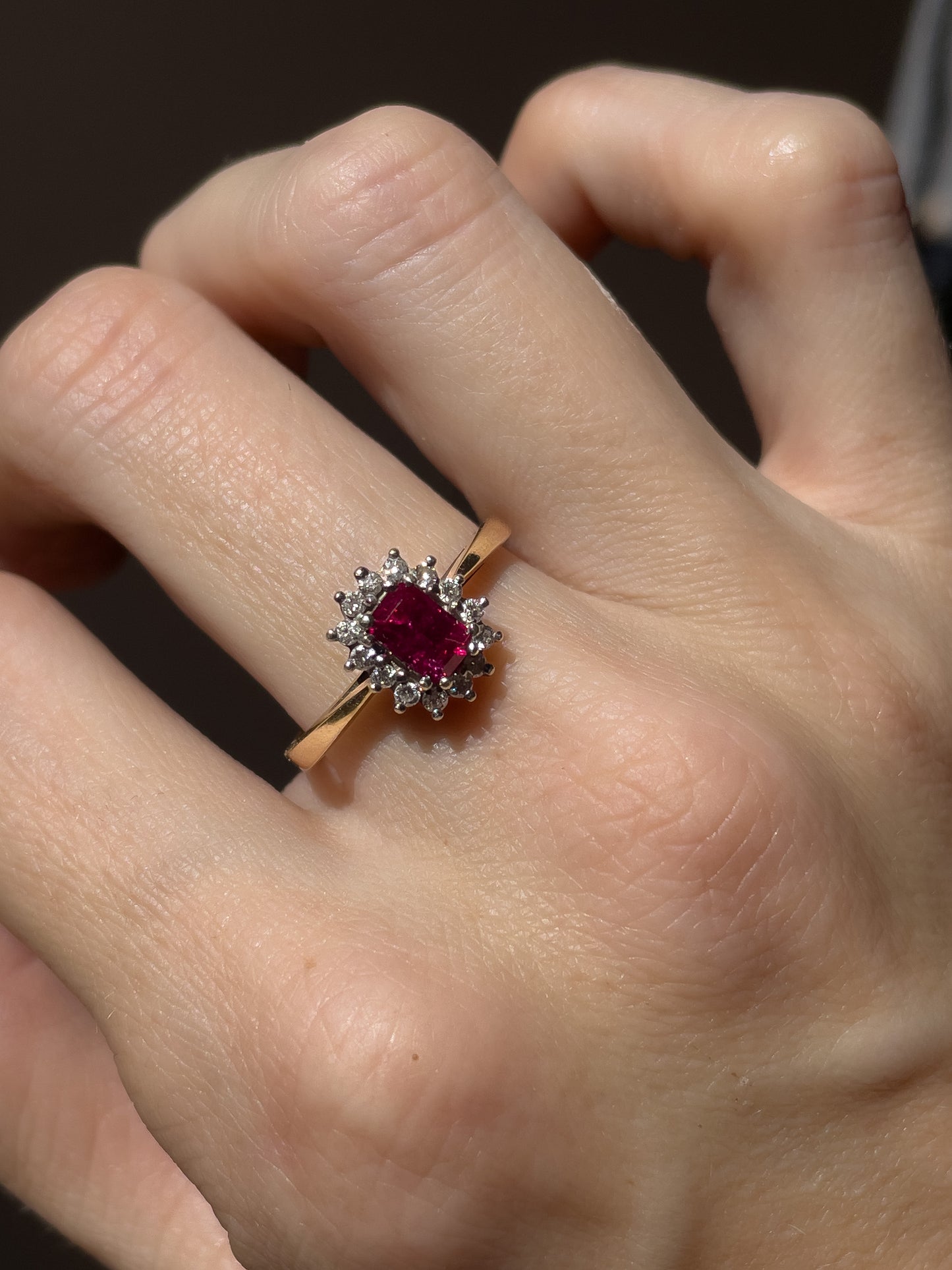 Vintage ruby and diamond halo cluster on 9ct gold