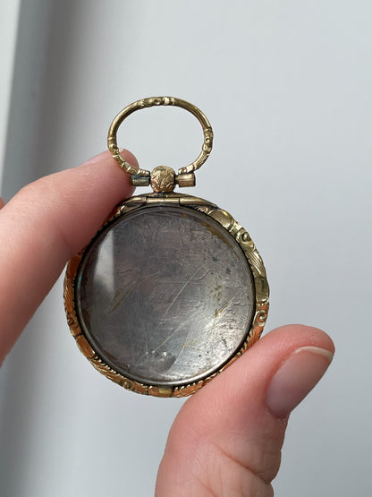 Antique mourning locket with glass cover