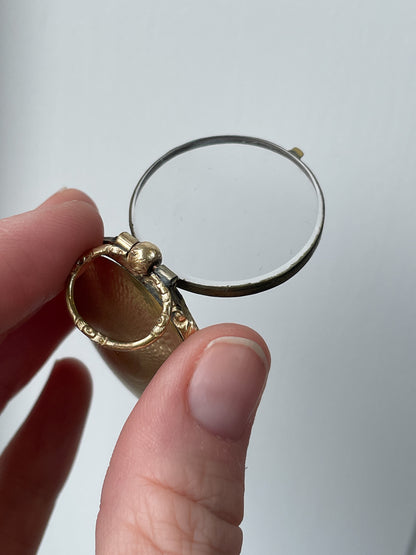 Antique mourning locket with glass cover