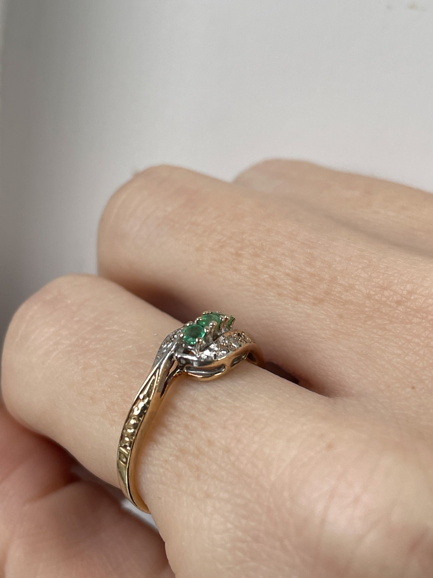 9ct gold emerald and diamond bypass ring from 1982