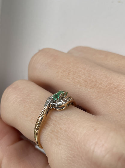 9ct gold emerald and diamond bypass ring from 1982