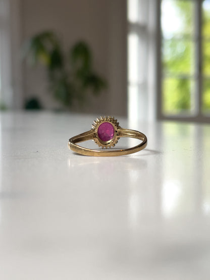 Vintage ruby and diamond halo cluster ring on 9ct gold