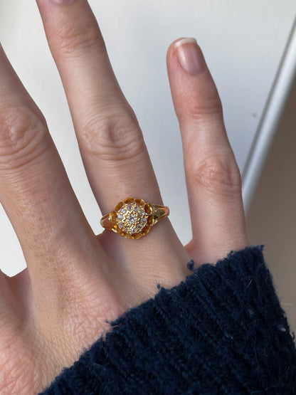 Antique diamond starburst halo ring on 18ct gold