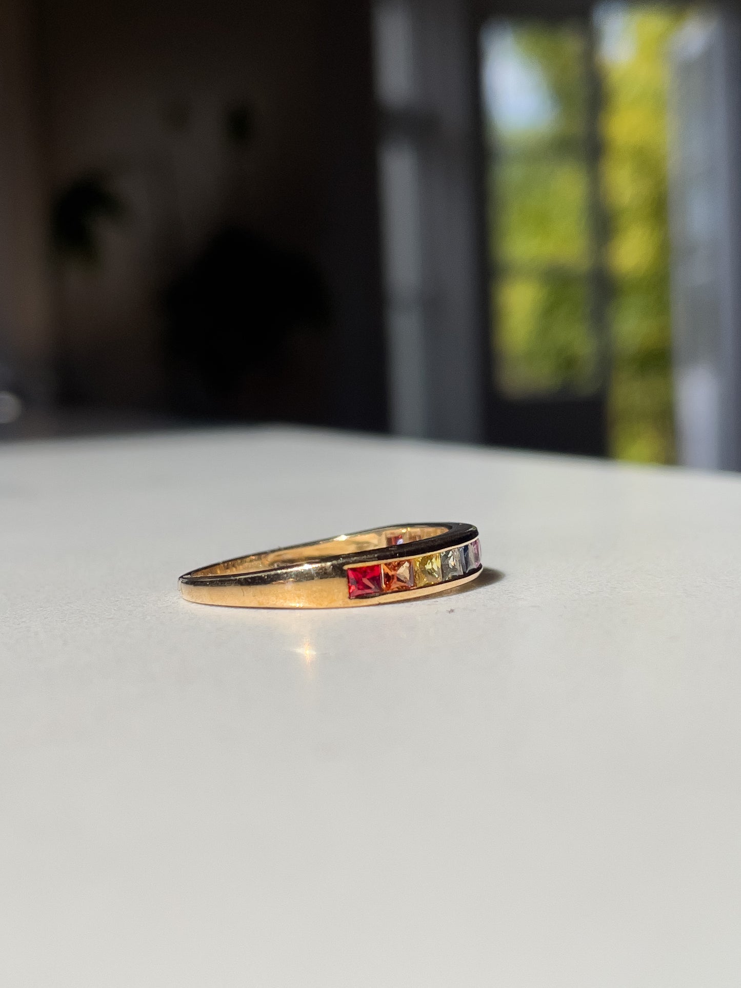 Contemporary vari-hue sapphire ring on 9ct gold