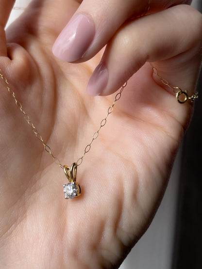 Vintage .25ct diamond solitaire pendant and chain