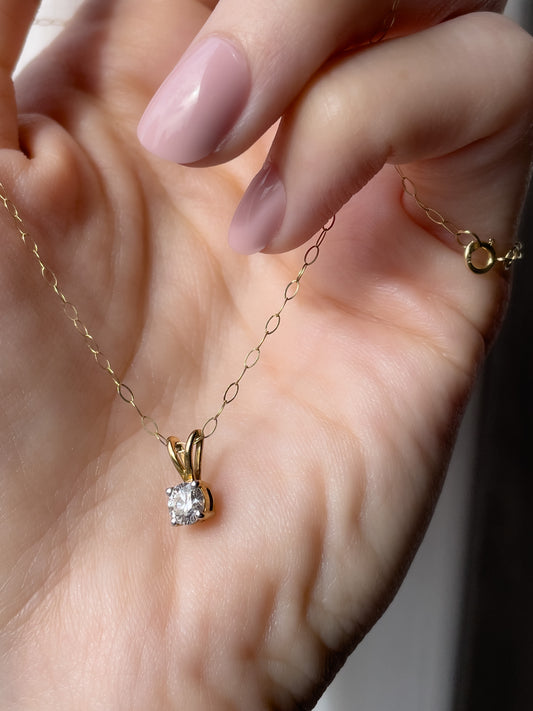 Vintage .25ct diamond solitaire pendant and chain