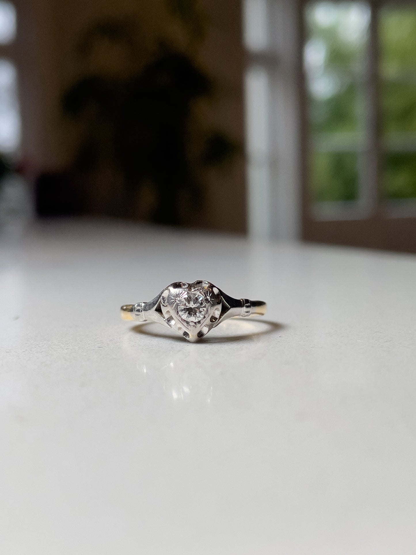 Antique heart shaped diamond solitaire ring on 18ct gold and platinum