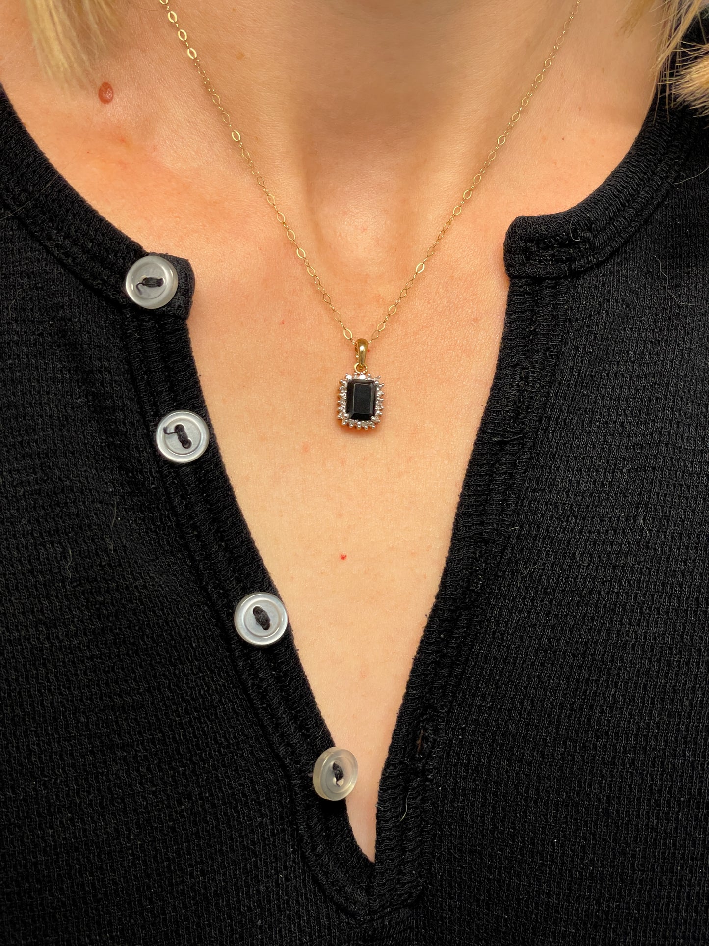 Vintage 1.25ct sapphire and diamond halo pendant with 9ct gold chain