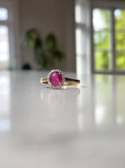 Vintage ruby and diamond halo cluster ring on 9ct gold
