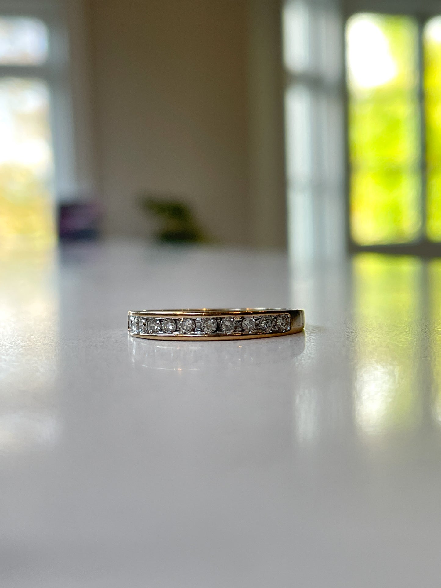 Vintage channel set diamond half eternity ring on 9ct gold
