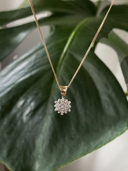 Vintage diamond cluster pendant with 9ct gold chain