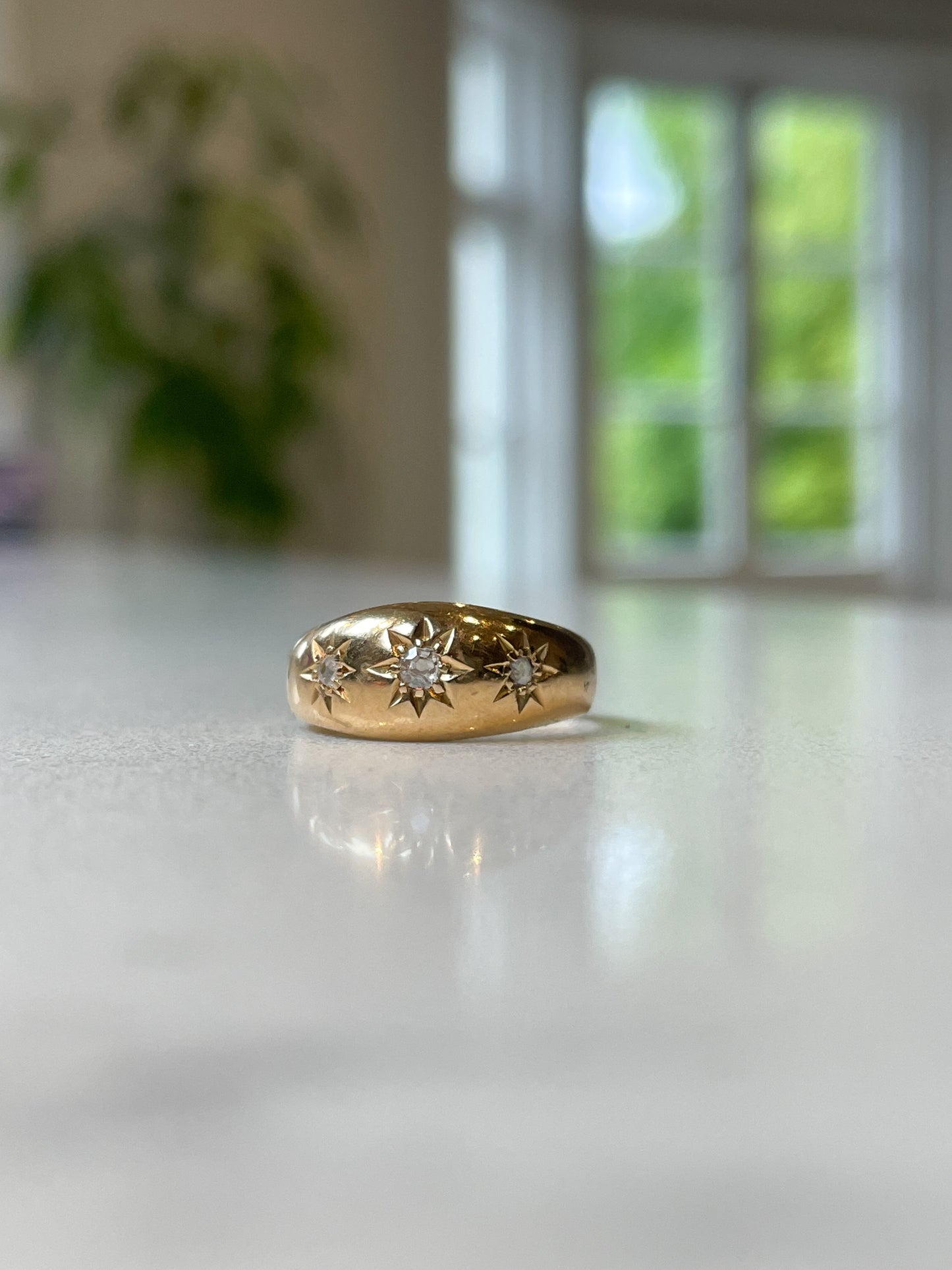 Antique starburst gypsy ring on 18ct gold