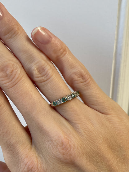 Vintage emerald and diamond half eternity ring on 9ct gold