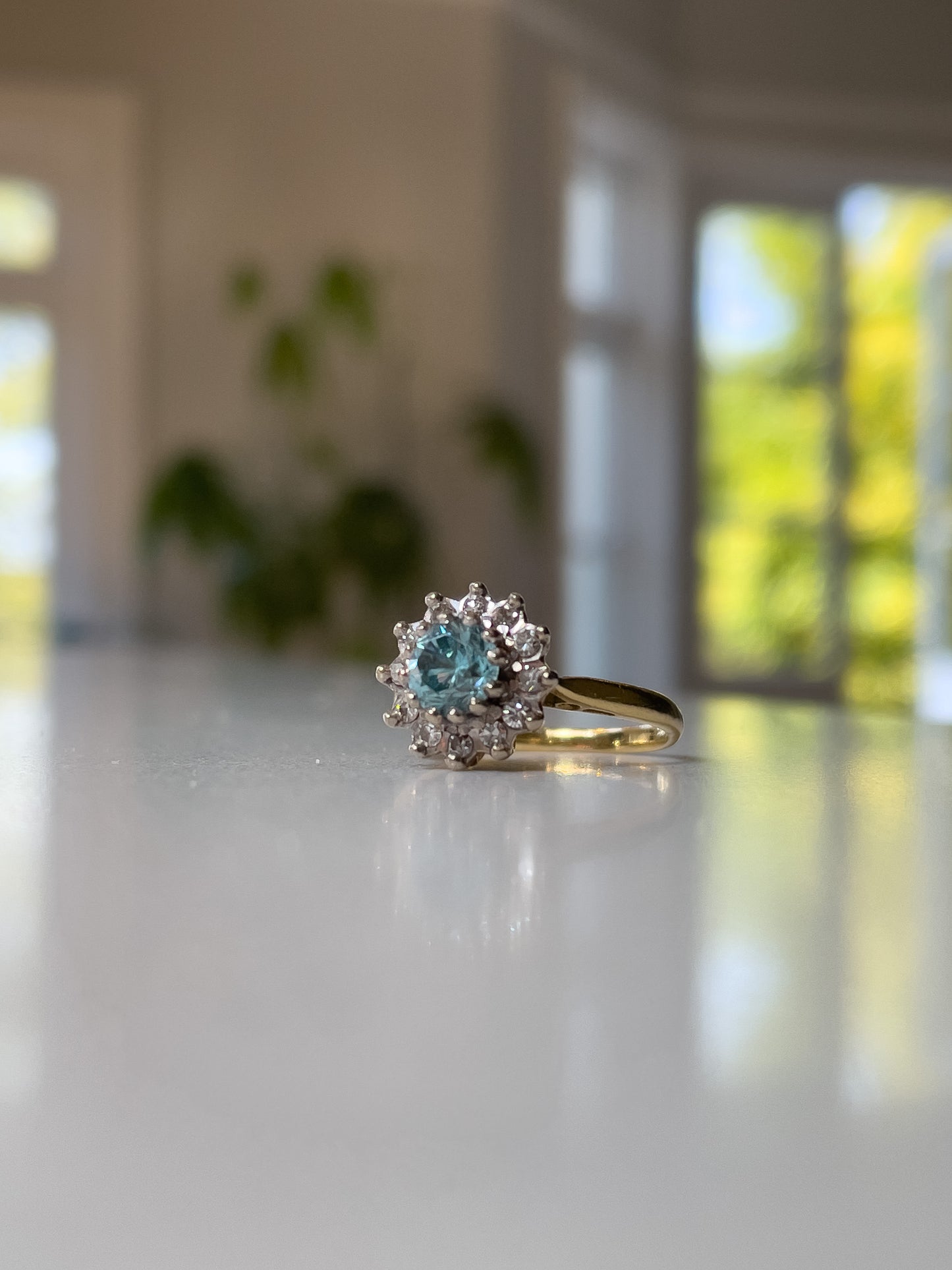 Vintage blue zircon and diamond daisy cluster ring on 18ct gold (with valuation for £1,900)