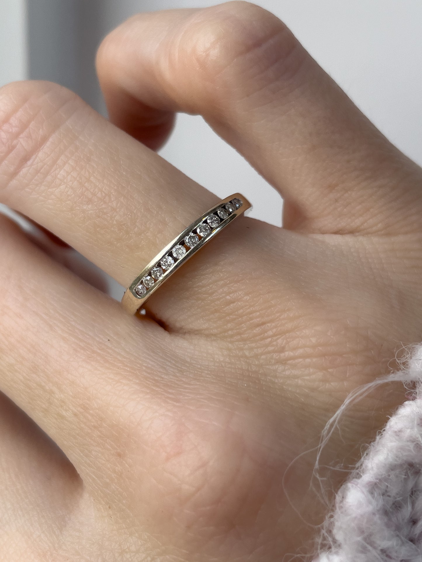 Vintage channel set diamond half eternity ring on 9ct white gold