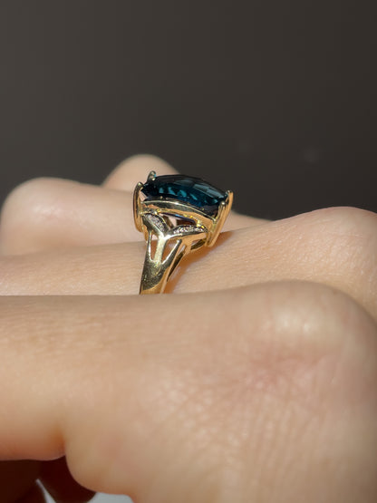 Contemporary blue topaz and diamond cocktail ring on 9ct gold