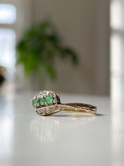 9ct gold emerald and diamond bypass ring from 1982