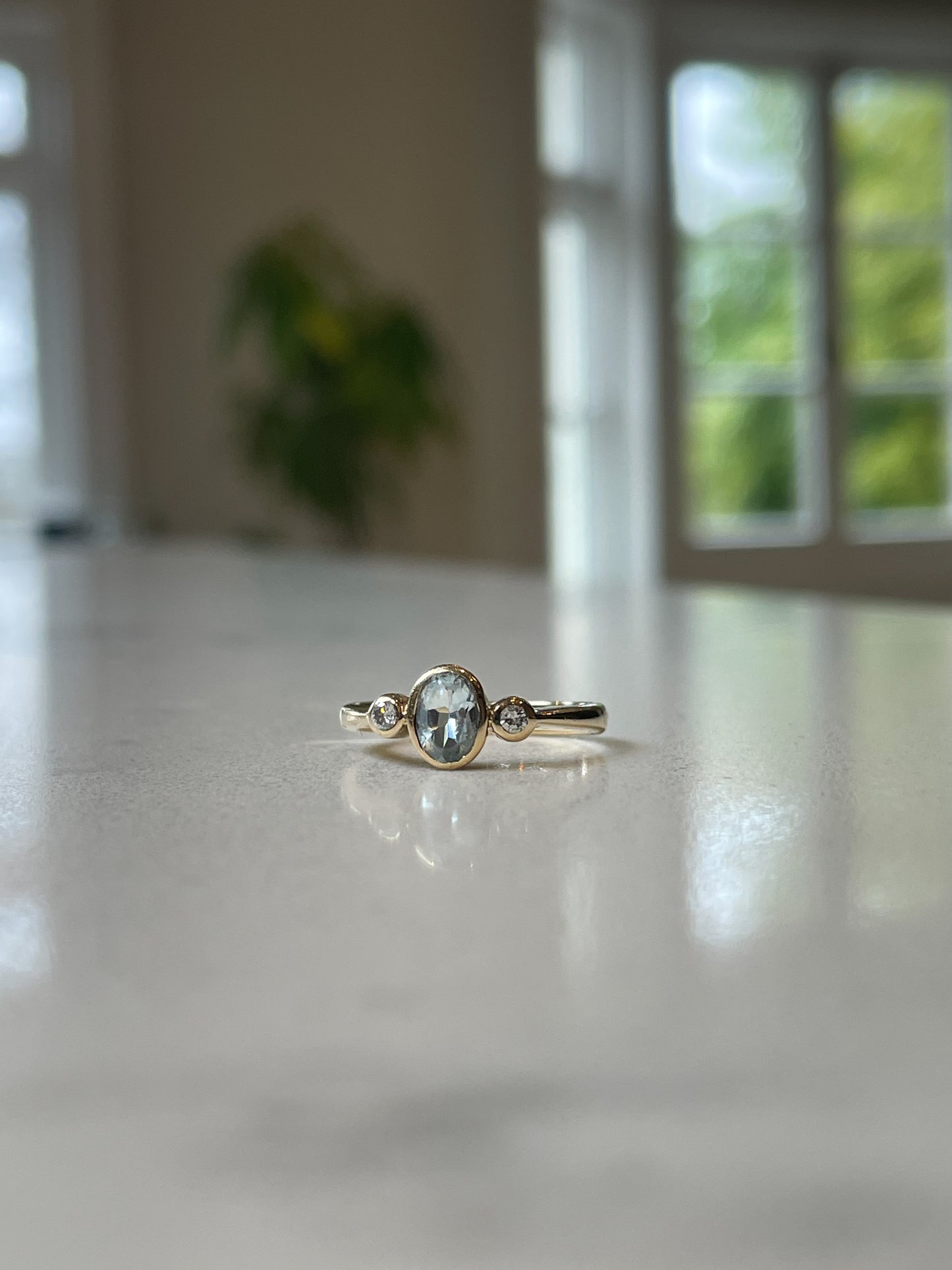Vintage aquamarine and diamond trilogy ring on 9ct gold