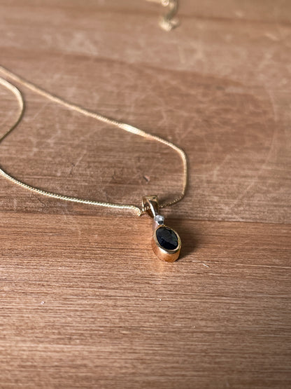 Sapphire and diamond necklace pendant on 9ct gold chain