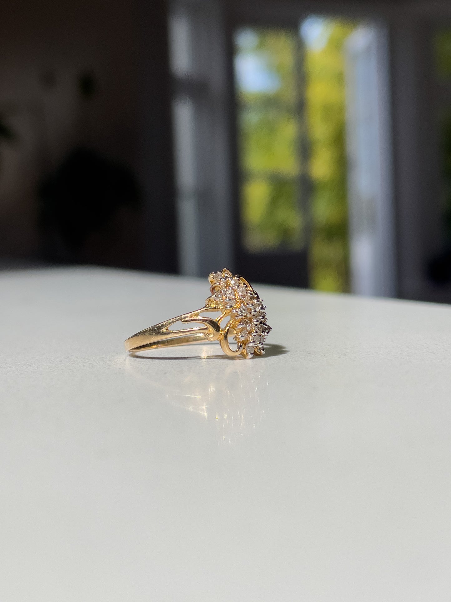 Vintage diamond cluster ring on 9ct gold