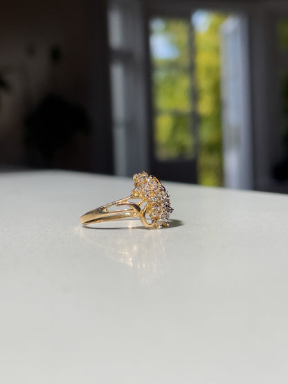 Vintage diamond cluster ring on 9ct gold