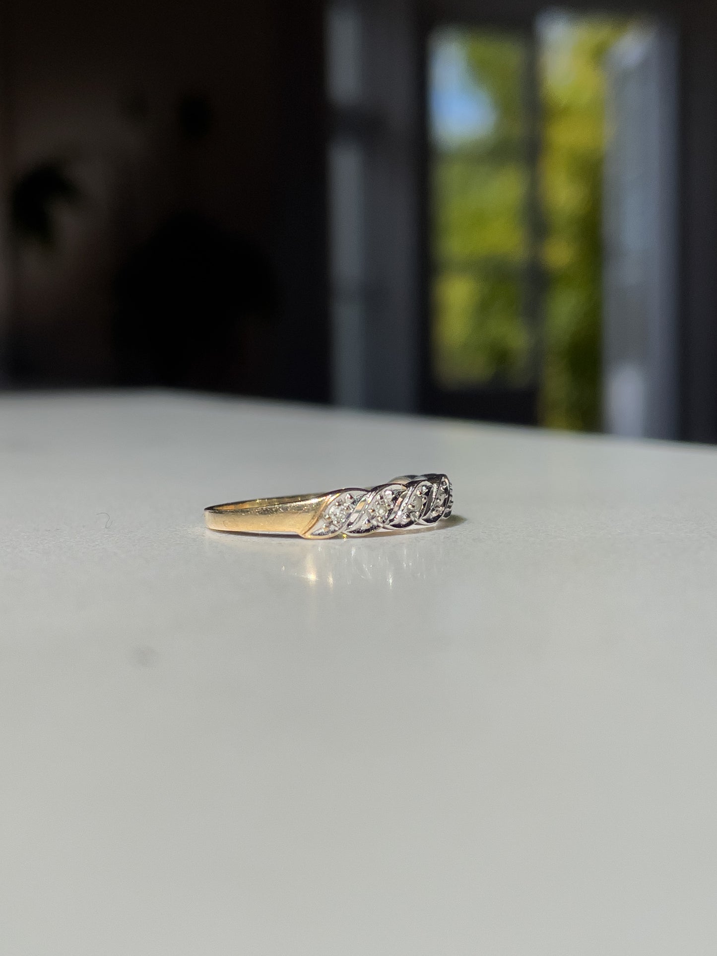 Vintage 'wavy' diamond half eternity ring on 9ct gold