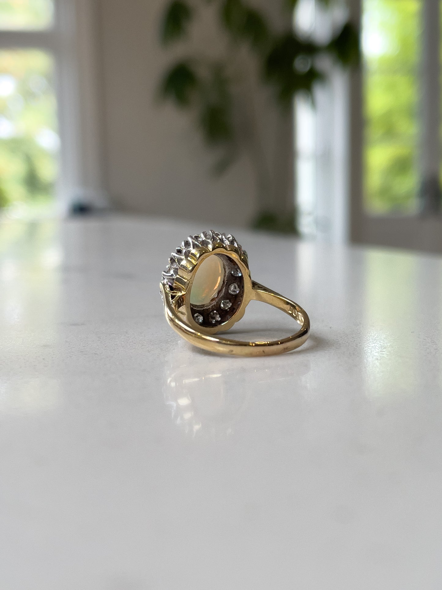 Vintage opal and diamond halo cluster ring on 18ct gold